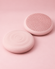 Les deux faces du coussin d’équilibre Pilates rose