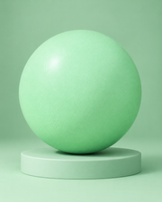 Mini ballon Pilates 25 cm vert sur socle et fond vert