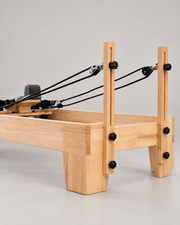 Poulies, cordes et montants du reformer Pilates en bois fixe
