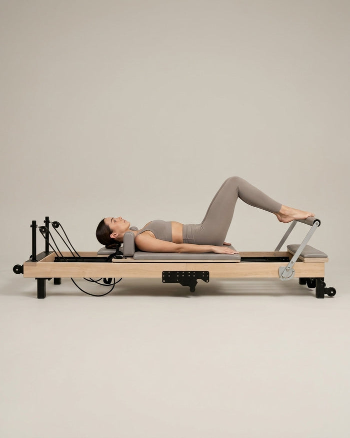 Reformer Pilates pliable en bois